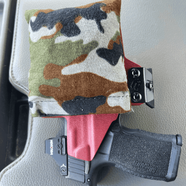 IWB holster wedge attached to an inside-the-waistband holster, designed to improve concealment, stability, and comfort for appendix carry.